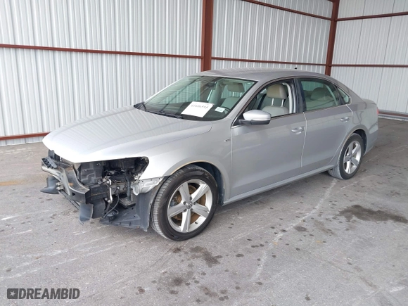 2014 Volkswagen Passat Wolfsburg Ed with VIN 1VWAS7A32EC036193, listed as a IAAI auction lot 41606595 with 77,536 mi miles. Bid and sale history available at carsss.com. Image 2.