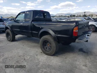 1999 Toyota Tacoma with VIN 4TAWN72N2XZ503012, listed as a Copart auction lot 51633105 with 120,244 mi miles and Salvage title. Bid and sale history available at DreamBid. Image 2.