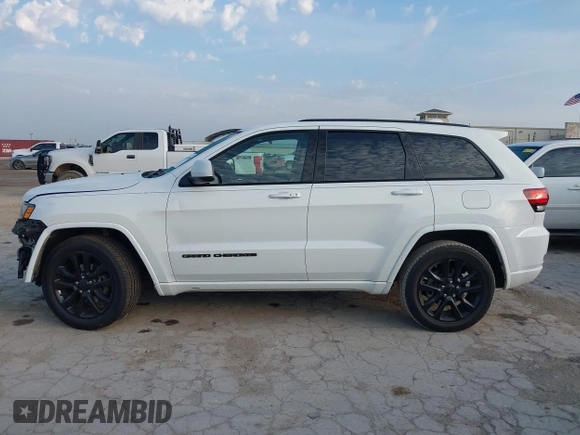 2017 Jeep Grand Cherokee Laredo with VIN 1C4RJEAG1HC720656, listed as a IAAI auction lot 42263500 with 184,239 mi miles and . Bid and sale history available at DreamBid. Image 15.
