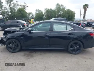 2022 Nissan Sentra SR z VIN 3N1AB8DV3NY295100, wystawiony jako IAAI lot #41901931 z przebiegiem 40 811 mil mil oraz . Historia ofert i sprzedaży dostępna na DreamBid. Obrazek 14.