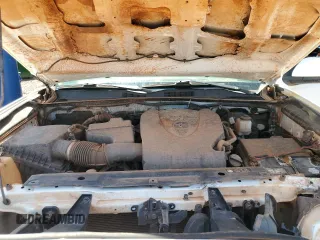 2019 Toyota Tacoma SR z VIN 3TMCZ5AN2KM221349, wystawiony jako Copart lot #60332685 z przebiegiem 109 907 mil mil oraz Szkoda całkowita • Salvage title. Historia ofert i sprzedaży dostępna na DreamBid. Obrazek 11.