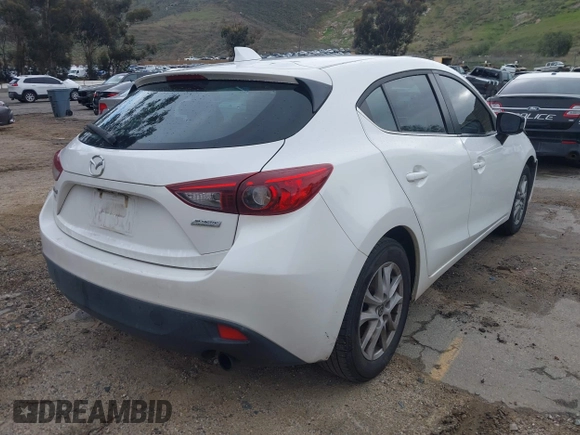 2014 Mazda 3 i Grand Touring with VIN JM1BM1M78E1208462, listed as a IAAI auction lot 41774218 with 82,781 mi miles and . Bid and sale history available at DreamBid. Image 4.
