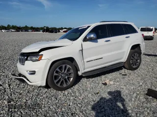 2017 Jeep Grand Cherokee Overland with VIN 1C4RJFCG2HC769223, listed as a Copart auction lot 60676775 with 83,962 mi miles and Salvage title. Bid and sale history available at DreamBid. Image 1.