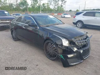 2014 Cadillac ATS Standard RWD z VIN 1G6AA5RA8E0167775, wystawiony jako IAAI lot #41972796 z przebiegiem 145 443 mil mil oraz . Historia ofert i sprzedaży dostępna na DreamBid. Obrazek 1.