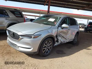2017 Mazda CX-5 Grand Touring with VIN JM3KFADL3H0121772, listed as a IAAI auction lot 41935183 with 48,869 mi miles and . Bid and sale history available at carsss.com. Image 6.
