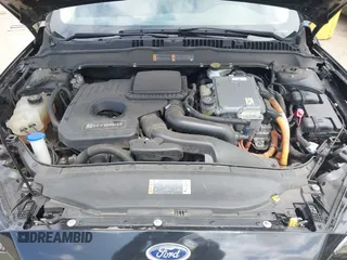 2020 Ford Fusion SE z VIN 3FA6P0LU7LR170922, wystawiony jako IAAI lot #42121025 z przebiegiem 115 799 mil mil oraz . Historia ofert i sprzedaży dostępna na DreamBid. Obrazek 10.