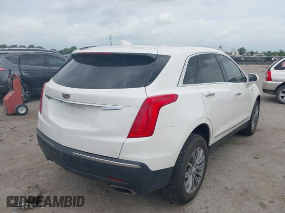 2019 Cadillac XT5 Luxury FWD z VIN 1GYKNCRSXKZ286643, wystawiony jako IAAI lot #42129213 z przebiegiem 87 091 mil mil oraz . Historia ofert i sprzedaży dostępna na DreamBid. Obrazek 4.
