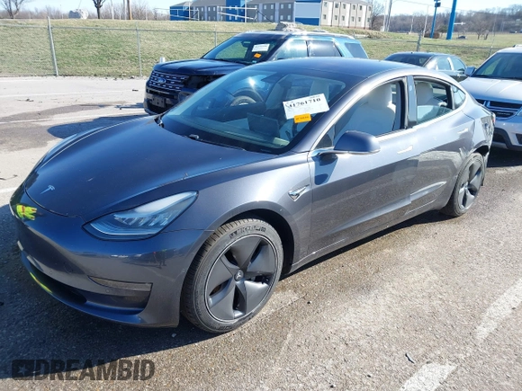 2018 Tesla Model 3 Long Range Battery with VIN 5YJ3E1EB6JF122167, listed as a IAAI auction lot 41761710 with 76,199 mi miles and . Bid and sale history available at DreamBid. Image 19.