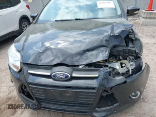 2014 Ford Focus SE z VIN 1FADP3K20EL173638, wystawiony jako IAAI lot #42265687 z przebiegiem 41 792 mil mil oraz . Historia ofert i sprzedaży dostępna na DreamBid. Obrazek 6.