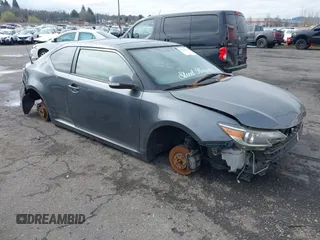 2014 Scion tC with VIN JTKJF5C77E3076077, listed as a IAAI auction lot 41764639 with 1 mi miles. Bid and sale history available at carsss.com. Image 1.