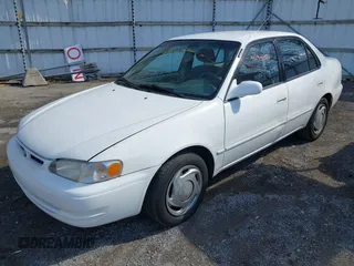 1998 Toyota Corolla VE with VIN 1NXBR18E5WZ081983, listed as a IAAI auction lot 41941472 with 164,536 mi miles and . Bid and sale history available at DreamBid. Image 2.