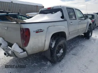 2011 GMC Canyon SLT with VIN 1GTH6NFE2B8117617, listed as a Copart auction lot 43222695 with 146,277 mi miles and Salvage Title. Bid and sale history available at carsss.com. Image 3.