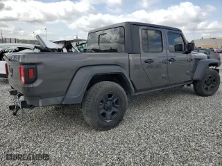 2023 Jeep Gladiator Freedom with VIN 1C6JJTAG9PL557861, listed as a Copart auction lot 50452955 with 44,716 mi miles and Salvage Title. Bid and sale history available at carsss.com. Image 3.