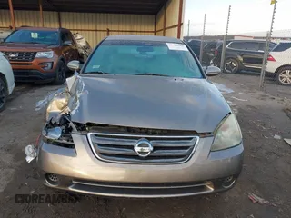2004 Nissan Altima S with VIN 1N4AL11D44C168527, listed as a IAAI auction lot 41320562 with 94,803 mi miles. Bid and sale history available at carsss.com. Image 13.