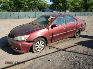 2004 Toyota Camry LE z VIN 4T1BE30K44U299631, wystawiony jako Copart lot #53949745 z przebiegiem 247 444 mil mil oraz Szkoda całkowita • Salvage title. Historia ofert i sprzedaży dostępna na DreamBid. Obrazek 1.