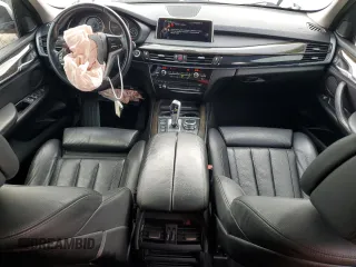 2015 BMW X5 xDrive50i with VIN 5UXKR6C51F0J74160, listed as a Copart auction lot 79337044 with 143,436 mi miles and Salvage title. Bid and sale history available at DreamBid. Image 8.
