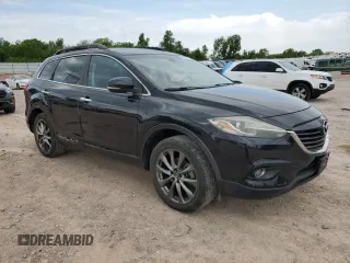2015 Mazda CX-9 Grand Touring z VIN JM3TB2DA3F0452322, wystawiony jako Copart lot #57821285 z przebiegiem 147 610 mil mil oraz Czysty tytuł • Clean title. Historia ofert i sprzedaży dostępna na DreamBid. Obrazek 4.