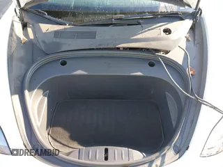 2023 Tesla Model 3 with VIN 5YJ3E1EA2PF582331, listed as a IAAI auction lot 41043858 with 33,601 mi miles and . Bid and sale history available at DreamBid. Image 10.