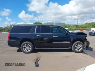 2016 Chevrolet Suburban LT with VIN 1GNSCHKC5GR288312, listed as a IAAI auction lot 41681664 with 195,619 mi miles and . Bid and sale history available at DreamBid. Image 14.