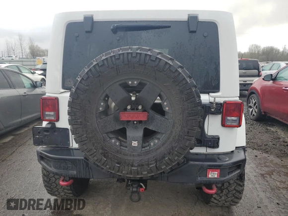 2015 Jeep Wrangler Unlimited Rubicon Hard Rock с VIN 1C4HJWFG8FL647910, выставлен на аукционе Copart как лот 46716605 с пробегом 48 139 миль миль и Списание • Salvage title. История ставок и продаж доступна на DreamBid. Изображение 6.