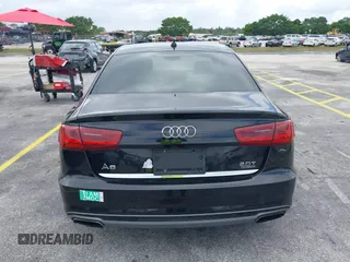 2016 Audi A6 2.0T Premium Plus with VIN WAUGFAFC6GN055826, listed as a IAAI auction lot 42011778 with 98,210 mi miles. Bid and sale history available at carsss.com. Image 16.