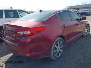 2012 Kia Optima SX z VIN 5XXGR4A60CG049992, wystawiony jako IAAI lot #41760937 z przebiegiem 153 769 mil mil oraz . Historia ofert i sprzedaży dostępna na DreamBid. Obrazek 4.