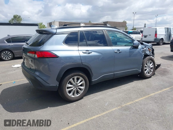 2022 Toyota Corolla Cross LE with VIN 7MUBAAAG1NV004852, listed as a IAAI auction lot 42251301 with 50,197 mi miles and . Bid and sale history available at DreamBid. Image 4.