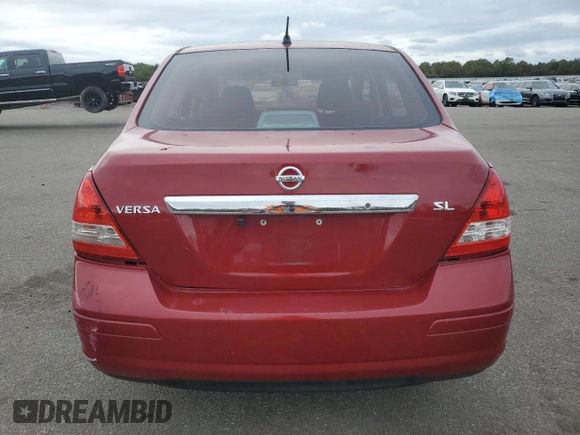 2010 Nissan Versa 1.8 S with VIN 3N1BC1AP4AL371722, listed as a Copart auction lot 72641144 with 128,445 mi miles and Salvage Title. Bid and sale history available at carsss.com. Image 6.