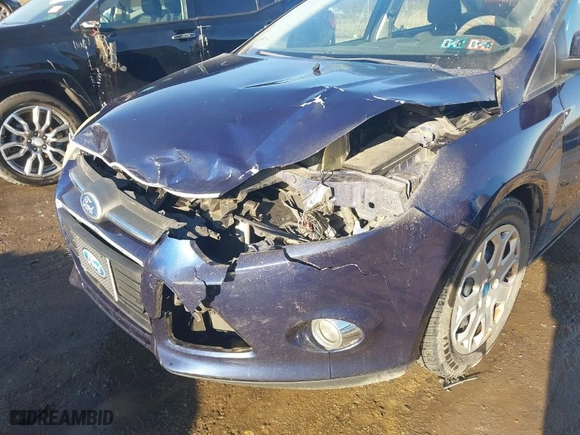 2012 Ford Focus SE with VIN 1FAHP3F21CL126644, listed as a IAAI auction lot 41592929 with 188,863 mi miles. Bid and sale history available at carsss.com. Image 6.