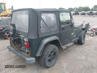 1999 Jeep Wrangler SE z VIN 1J4FY29P7XP479351, wystawiony jako IAAI lot #42797020 z przebiegiem 171 598 mil mil oraz . Historia ofert i sprzedaży dostępna na DreamBid. Obrazek 4.
