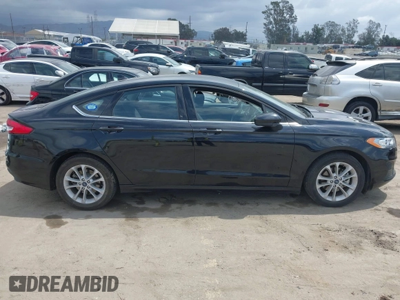 2020 Ford Fusion SE z VIN 3FA6P0LU7LR170922, wystawiony jako IAAI lot #42121025 z przebiegiem 115 799 mil mil oraz . Historia ofert i sprzedaży dostępna na DreamBid. Obrazek 13.