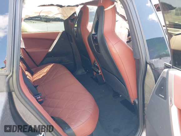2024 BMW iX xDrive50 z VIN WB523CF04RCR31259, wystawiony jako IAAI lot #41559235 z przebiegiem Nie podano mil oraz . Historia ofert i sprzedaży dostępna na DreamBid. Obrazek 8.