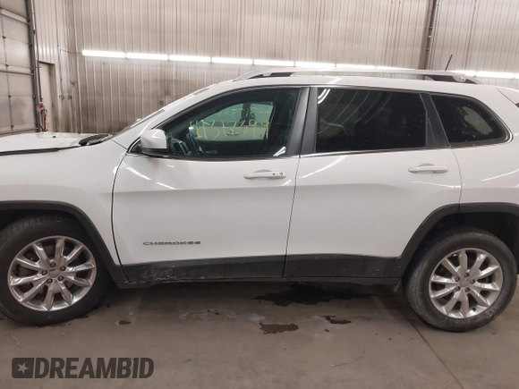 2016 Jeep Cherokee Limited z VIN 1C4PJMDS7GW250969, wystawiony jako IAAI lot #41317399 z przebiegiem 118 598 mil mil oraz . Historia ofert i sprzedaży dostępna na DreamBid. Obrazek 15.