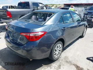 2018 Toyota Corolla L with VIN 5YFBURHE1JP832911, listed as a IAAI auction lot 42237901 with 92,158 mi miles and . Bid and sale history available at DreamBid. Image 4.