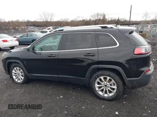 2019 Jeep Cherokee Latitude with VIN 1C4PJLCBXKD357403, listed as a IAAI auction lot 41606497 with 104,102 mi miles and . Bid and sale history available at carsss.com. Image 14.