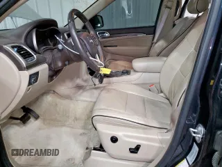 2016 Jeep Grand Cherokee Overland with VIN 1C4RJFCT9GC334520, listed as a Copart auction lot 56886055 with 84,390 mi miles and Clean title. Bid and sale history available at DreamBid. Image 7.