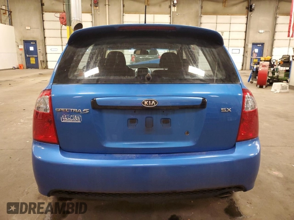 2007 Kia Spectra with VIN KNAFE161775007569, listed as a Copart auction lot 86778784 with 125,463 mi miles and Salvage Title. Bid and sale history available at carsss.com. Image 6.