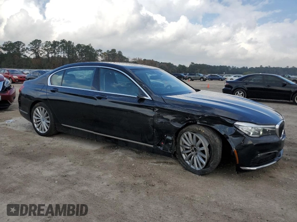 2018 BMW 7 Series 740i with VIN WBA7E2C54JG742927, listed as a Copart auction lot 70306082 with 69,735 mi miles. Bid and sale history available at carsss.com. Image 4.