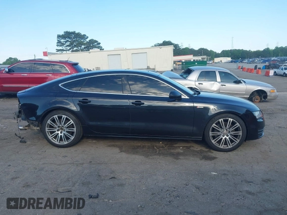2014 Audi A7 Premium Plus z VIN WAUWGAFC4EN092525, wystawiony jako IAAI lot #42331183 z przebiegiem 183 258 mil mil oraz . Historia ofert i sprzedaży dostępna na DreamBid. Obrazek 13.