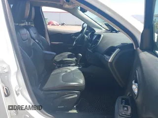 2014 Jeep Cherokee Trailhawk with VIN 1C4PJMBSXEW236807, listed as a IAAI auction lot 42660980 with 157,225 mi miles and . Bid and sale history available at DreamBid. Image 5.