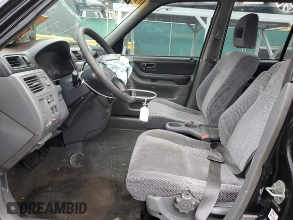 1998 Honda CR-V LX z VIN JHLRD184XWC103414, wystawiony jako Copart lot #54770395 z przebiegiem 233 166 mil mil oraz Szkoda całkowita • Salvage title. Historia ofert i sprzedaży dostępna na DreamBid. Obrazek 7.