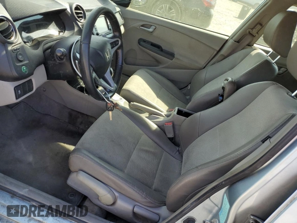 2012 Honda Insight EX z VIN JHMZE2H7XCS002156, wystawiony jako Copart lot #50825825 z przebiegiem 425 939 mil mil oraz Szkoda całkowita • Salvage title. Historia ofert i sprzedaży dostępna na DreamBid. Obrazek 7.