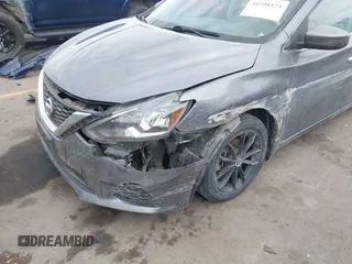 2019 Nissan Sentra S z VIN 3N1AB7AP4KY424604, wystawiony jako IAAI lot #41298124 z przebiegiem 73 000 mil mil oraz . Historia ofert i sprzedaży dostępna na DreamBid. Obrazek 5.