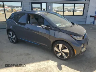 2014 BMW i3 with VIN WBY1Z4C56EV275504, listed as a Copart auction lot 57070015 with Not provided miles and Salvage title. Bid and sale history available at DreamBid. Image 4.