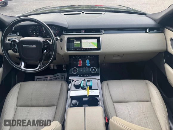 2018 Land Rover Range Rover Velar R-Dynamic SE z VIN SALYL2RX7JA715416, wystawiony jako Copart lot #62775895 z przebiegiem 123 921 mil mil oraz Czysty tytuł • Clean title. Historia ofert i sprzedaży dostępna na DreamBid. Obrazek 9.