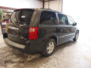 2010 Dodge Grand Caravan SXT with VIN 2D4RN5D19AR433481, listed as a IAAI auction lot 42123049 with 134,882 mi miles and . Bid and sale history available at DreamBid. Image 4.