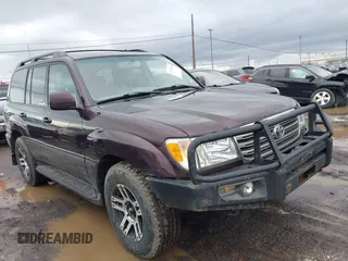 2004 Toyota Land Cruiser with VIN JTEHT05J242066695, listed as a IAAI auction lot 41725358 with 226,895 mi miles. Bid and sale history available at carsss.com. Image 1.
