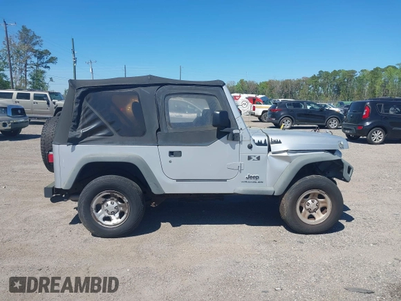 2006 Jeep Wrangler X with VIN 1J4FA39S86P743660, listed as a IAAI auction lot 41890339 with 198,099 mi miles and . Bid and sale history available at DreamBid. Image 13.