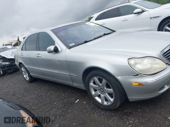 2002 Mercedes-Benz S-Class 5.0L with VIN WDBNG75J32A241980, listed as a IAAI auction lot 41971627 with 160,634 mi miles. Bid and sale history available at carsss.com. Image 13.