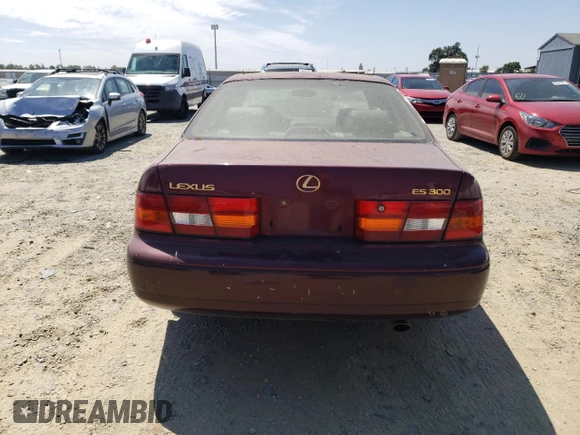 1997 Lexus ES 300 Luxury Sport Sdn with VIN JT8BF22G0V0030408, listed as a Copart auction lot 66811844 with 185,314 mi miles and Salvage Title. Bid and sale history available at carsss.com. Image 6.
